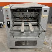 DESCRIPTION ROLLEM AUTO 4/35 AUTOMATIC PAPER PERFORATING, SCORING, AND SLITTING MACHINE. BRAND/MODEL