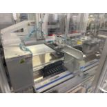 Battery cell pouching assembly