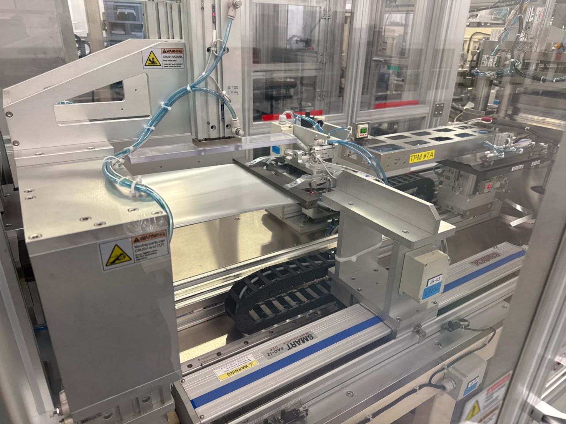 Battery cell pouching assembly