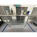 Stainless steel table with bench vise