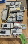 (3) MITSUBISHI MELSEC FX3U-48M PLC; (1) MITSUBISHI MELSEC FX0N-40MR-ES I/O UNIT; (1) OMRON SYSMAC
