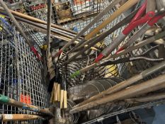 CRATE WITH SHOVELS; RAKES; PITCH FORKS (MAIN BLDG RM 2)