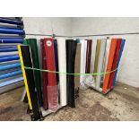 Approximately 43 Partial Rolls of 4' Vinyl, Plus 3 Rolled Vinyl Storage Carts
