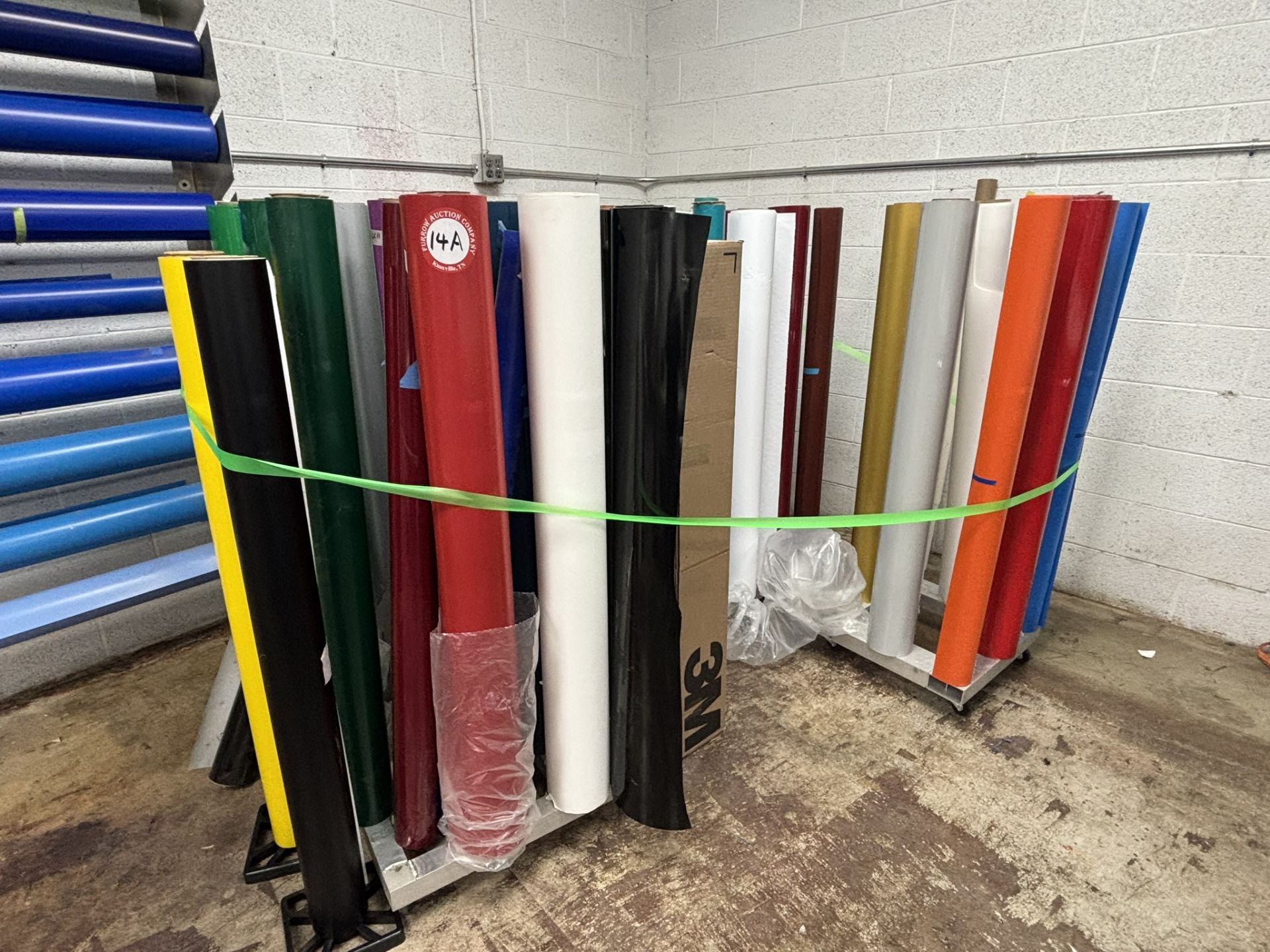 Approximately 43 Partial Rolls of 4' Vinyl, Plus 3 Rolled Vinyl Storage Carts