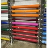 Approximately 9 Partial Rolls of 4' Vinyl, Assorted Colors, Plus Rolled Vinyl Storage Rack