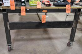 HEAVY DUTY METAL FABRICATED SHOP TABLE, 5"' CASTERS, WOOD SURFACE, 38"H X 121"L X 61"W, NO CONTENTS