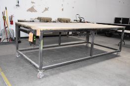 HEAVY DUTY ROLLING TABLE, METAL FRAME, WOOD TOP, NO CONTENTS, 10' X 5' X 40"H W/10" VISE