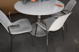 41" DIAMETER WHITE LAMINATE TABLE W/MODERN TULIP PEDESTAL, INCLUDES (4) CHAIRS, TOP SHOWS DAMAGE