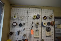 GRINDING WHEELS AND MISC. TOOLING ON PEGBOARD