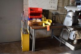 WOOD/METAL WORK TABLE WITH CONTENTS AND YELLOW ROD ORGANIZER ON FLOOR,