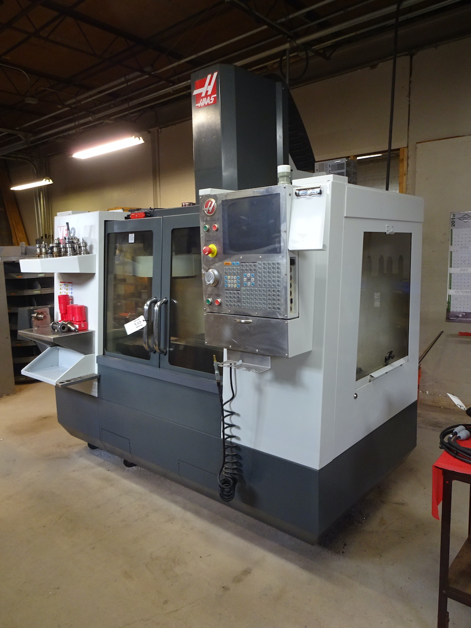 HAAS MODEL VF-2 CNC VERTICAL MACHINING CENTER, S/N 1098453, 20-STATION ATC, 16 X 36 X 20