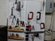 LOT ASSORTED HAND TOOLS & CLAMPS ON PEGBOARD ON WALL