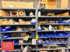 Racks with Assorted Parts, Including: Tankless Water Heaters, Poly Fittings, Chemical Spray Jugs,