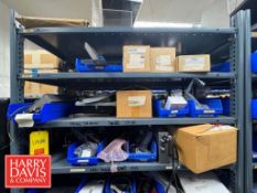 Rack of Metal Detector Parts, Including: Power Supplies, Transmitters, Adapters, Cable, Springs