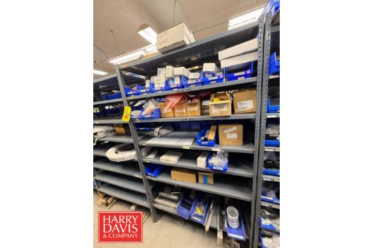 Zebra Printer Rack Rack with Assorted Zebra Printer Parts, Including: Media Kits, Drive ...
