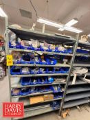 Rack with Assorted Label Aire Labeler Parts, Including: Clutch Inner Race, Disc Spacers, Cam