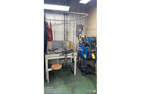 Welding table with Miller Invision 456P Arc welder and Miller 60M ...