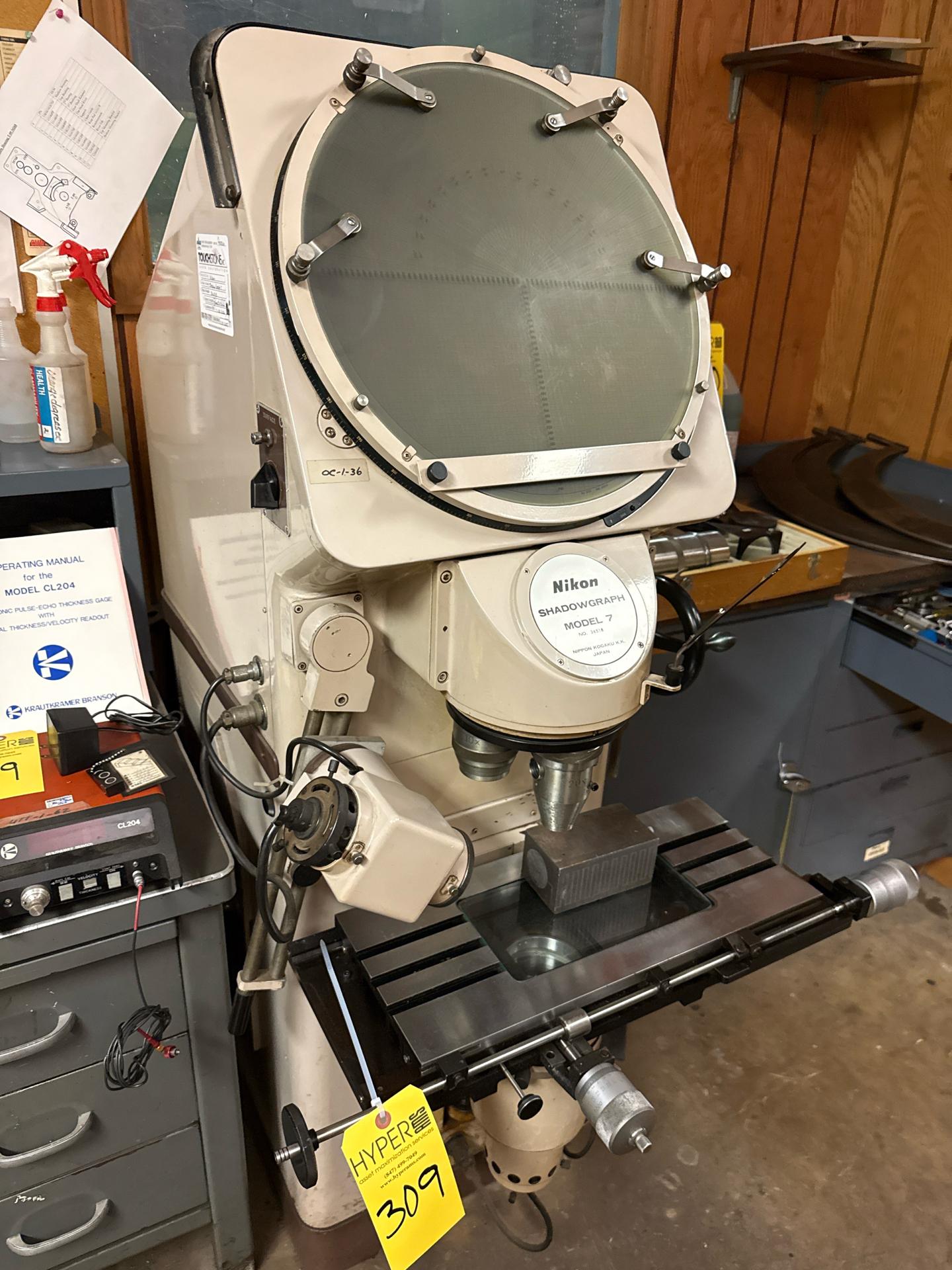 Address Comparator Nikon Shadowgraph Model 7 Optical Comparator featuring a 20X ...