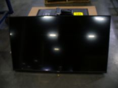 Vizio 50" TV with remote and wall hanger