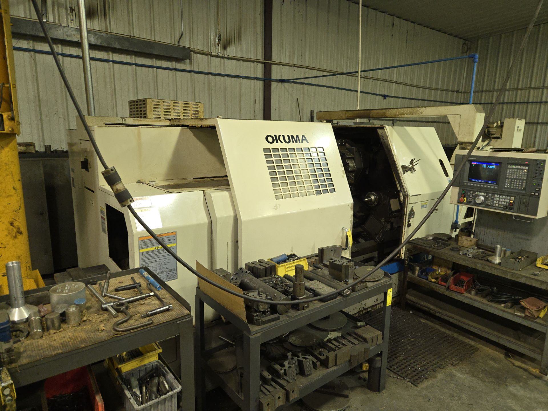 Okuma LB35II CNC Lathe w/ 12 Slot Turret, Tailstock, Okuma OSP7000L Controller