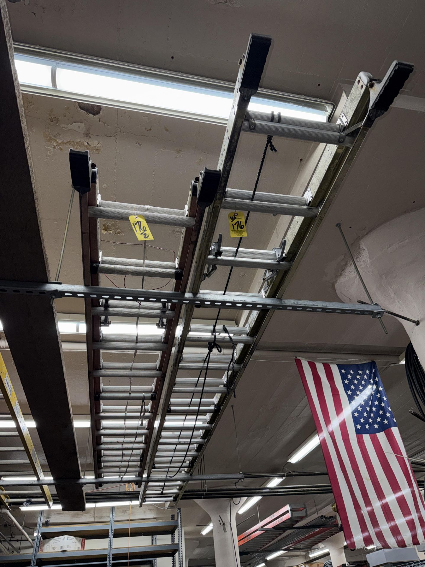 LOT (2) Asst. Extension Ladders. (1) 22' and (1) 28'