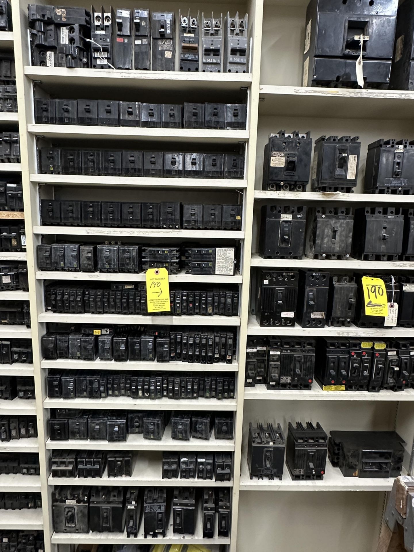LOT Asst. Electrical Breakers on 2 Sections Shelving