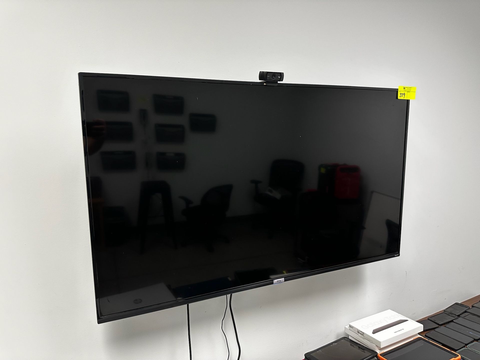 TLC Flat Screen TV, Logi Webcam, and Wall Mount