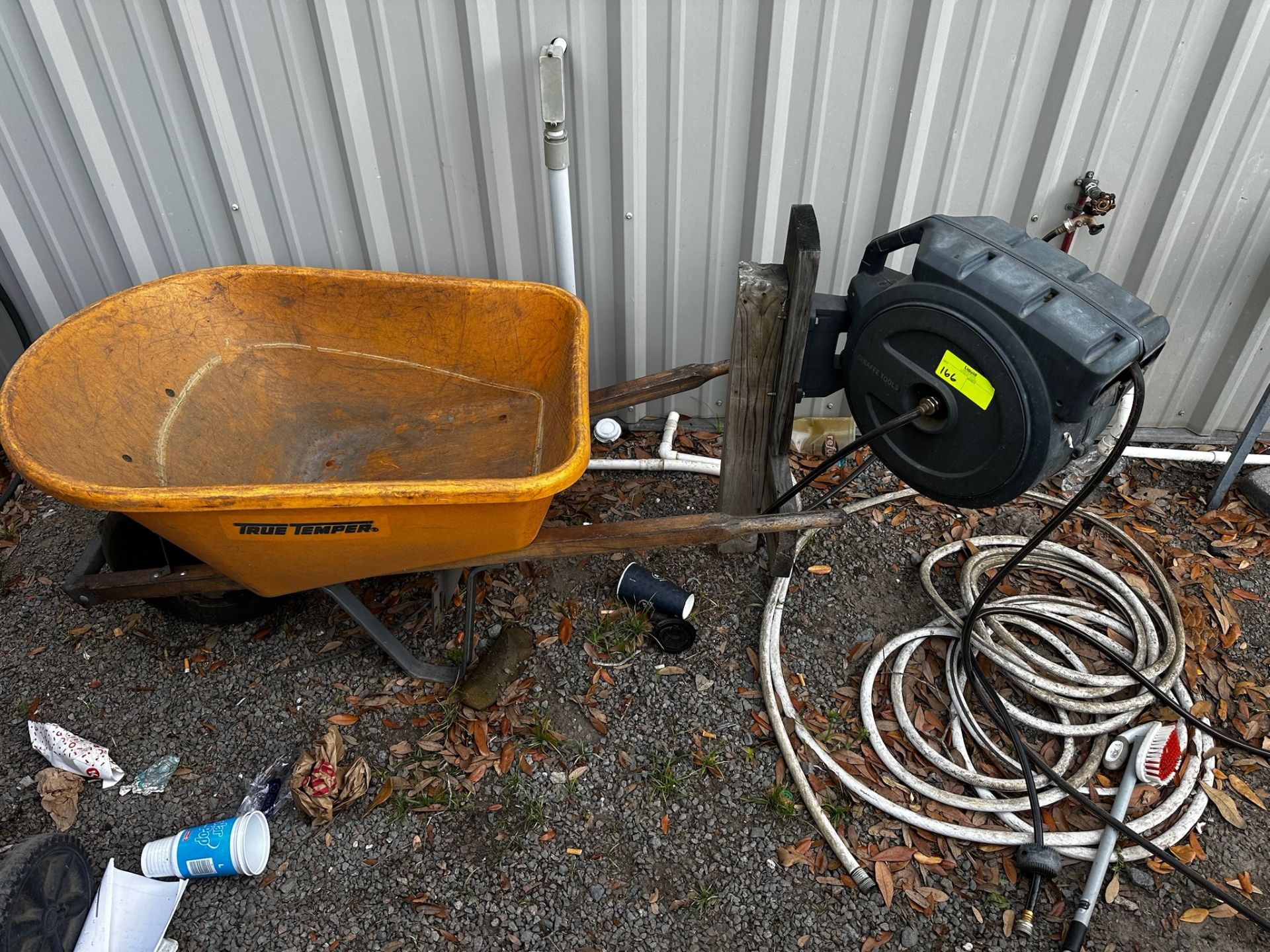 Hose Reel, Hoses, and Wheel Barrel