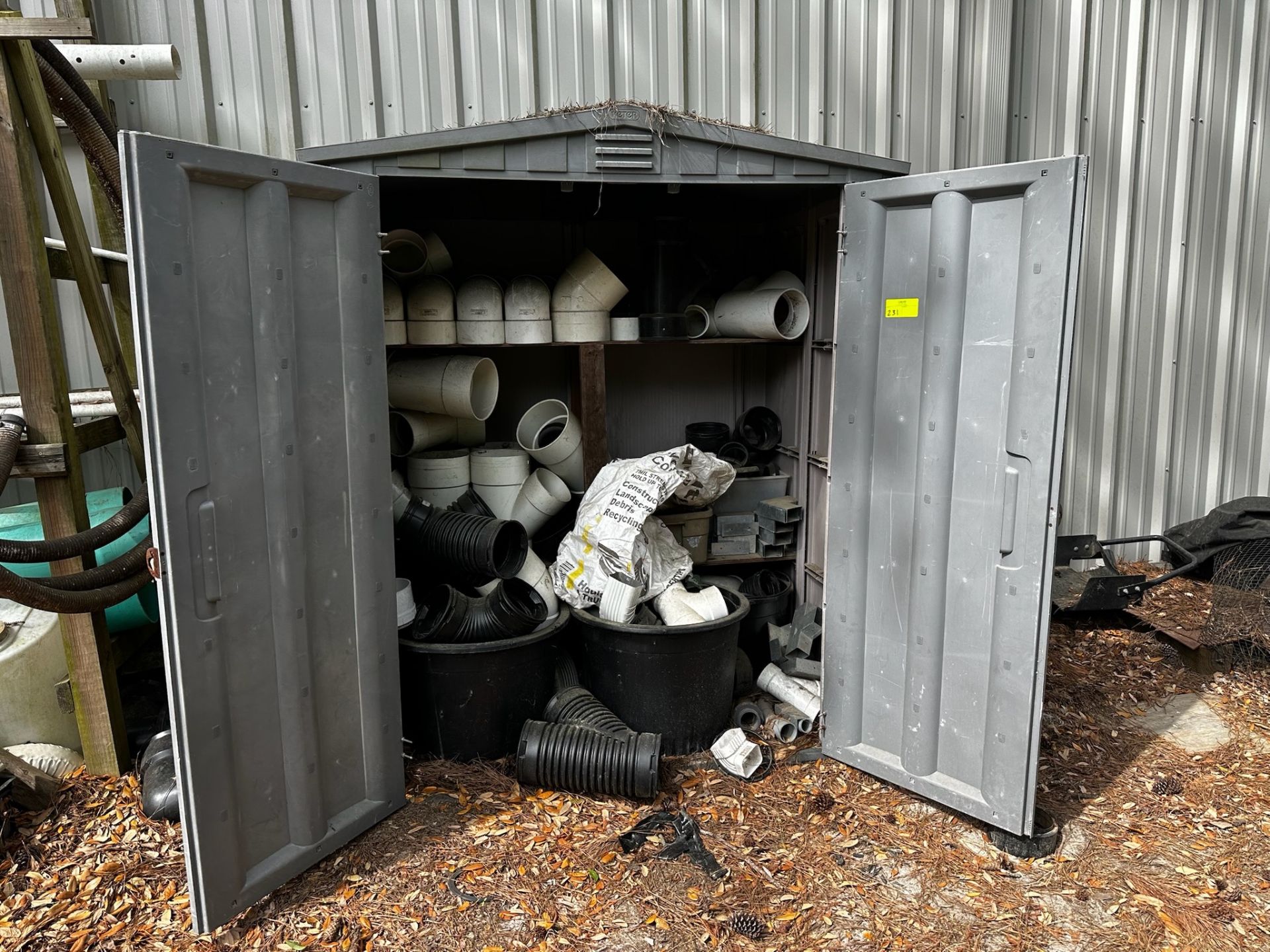 Assorted PVC and Corregated Pipe Connectors with Shed