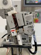 CVC Desiccant Pouch Inserter