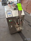 AUTOMATIC LIQUID PACKING MACHINE