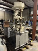 5-STATION ROTARY CAPPING STATION MOUNTED ON S/S FRAME (RIGGING, LOADING, SITE MANGEMENT FEE: $300.00
