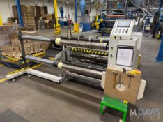 SLITTER WITH TENSION ROLLS