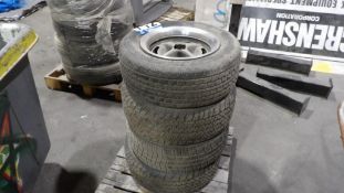 BFGoodrich Radial T/A Tires with 4-Spoke Rims, Set of 4