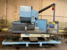 OKK MCV 860 Vertical CNC Machining Center, 90 1/2" x 33 1/2" Table, 50 Taper, 25 HP, 24-Station ATC,