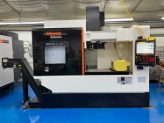 Mazak VCN-570C CNC 5 axis vertical machining center w/ 40 taper spindle, 51" x 21 1/2" T slotted tab