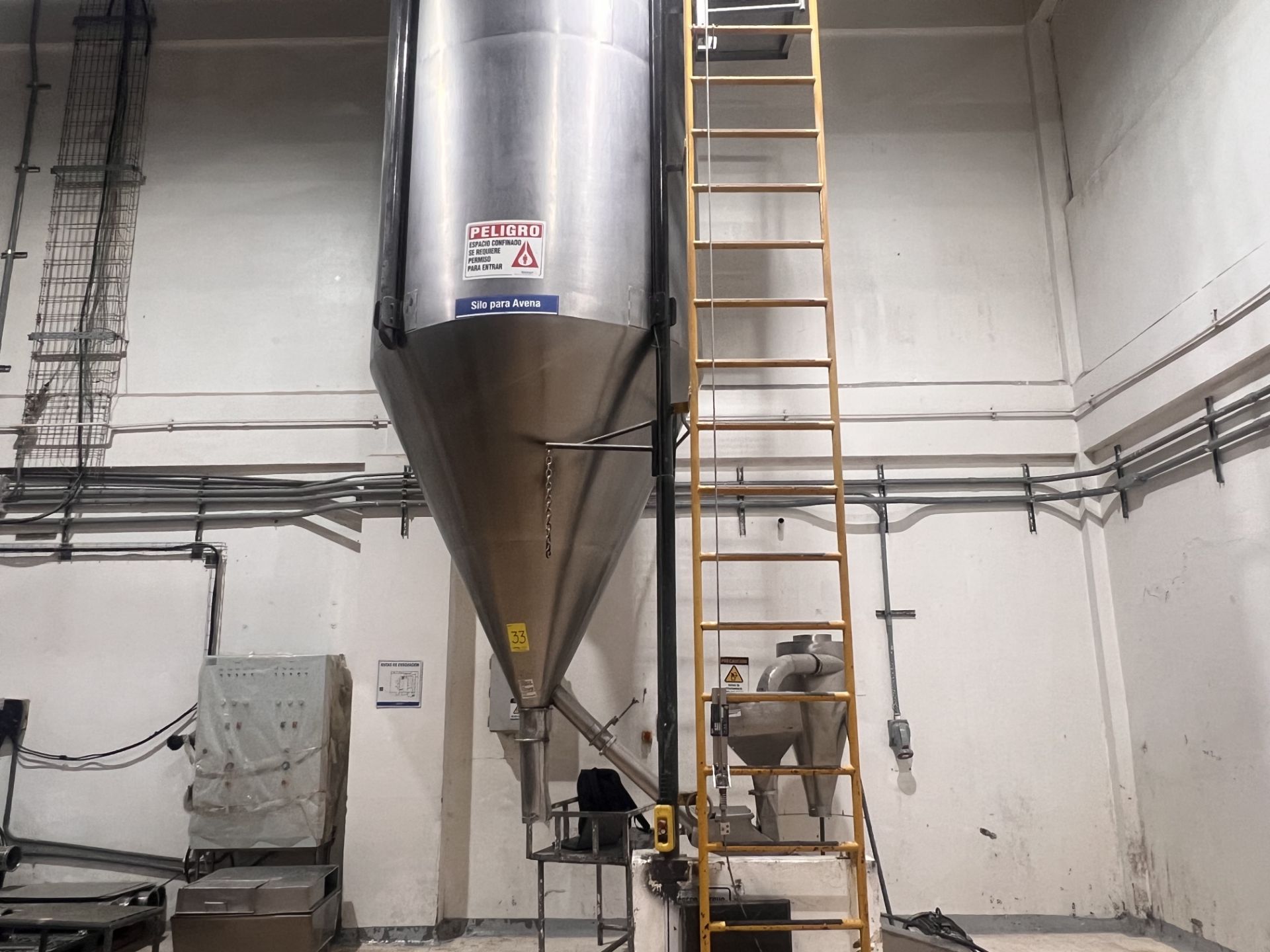 Oat pulverizing system, includes conical silo, pulverizer mill, hopper ...