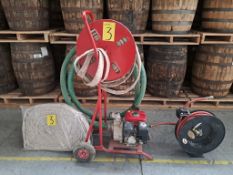 HONDA gasoline-powered water pump, Model WH20XT, 450 L/min , mounted on a portable base; includes h
