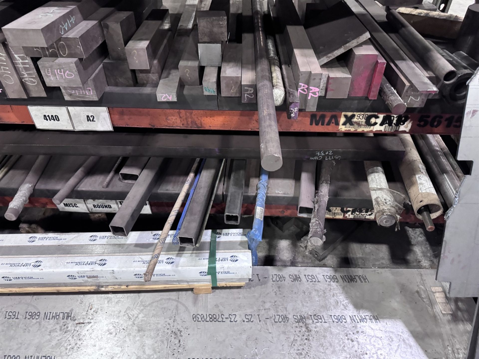 Pallet Rack w/ Assorted Stock Including Aluminum, 4140, Cold Rolled, and A2