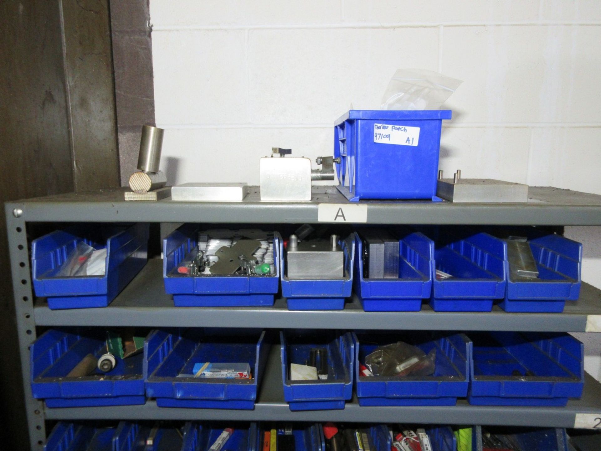 Hss Hardware Rack (1) Rack of Assorted HSS and Carbide End Mill, Drill, and Tapping Tooling.