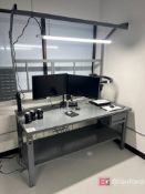 Uline Workbench w/ (2) Sceptre Monitors and Overhead Lighting