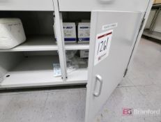 Contents of Cabinet: Plastic Syringes