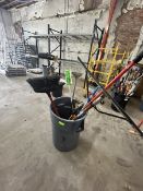 Barrel with miscellaneous items: Scraper, broom, pole saw, sledge hammer, axe etc…