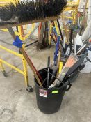 Barrel with miscellaneous items: Axe, level, broom, scraper etc…