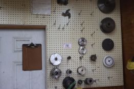 WALL OF ASSORTED RIPPING HEADS AND MOULDER HEADS