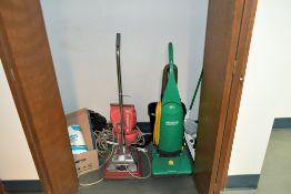 Lot - (2) Upright Vacuums, Mop and Cleaning Supplies in Closet