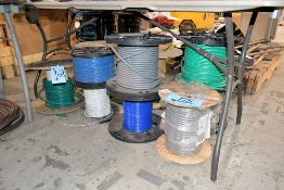 Lot - (10) Large Spools of Wire Under (1) Table