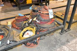 Lot - Extension Cords in (4) Stacks