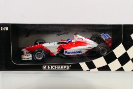 Minichamps - A boxed 1:18 scale model by