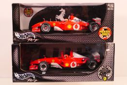 Hot Wheels - Two boxed 1:18 scale Ferrar